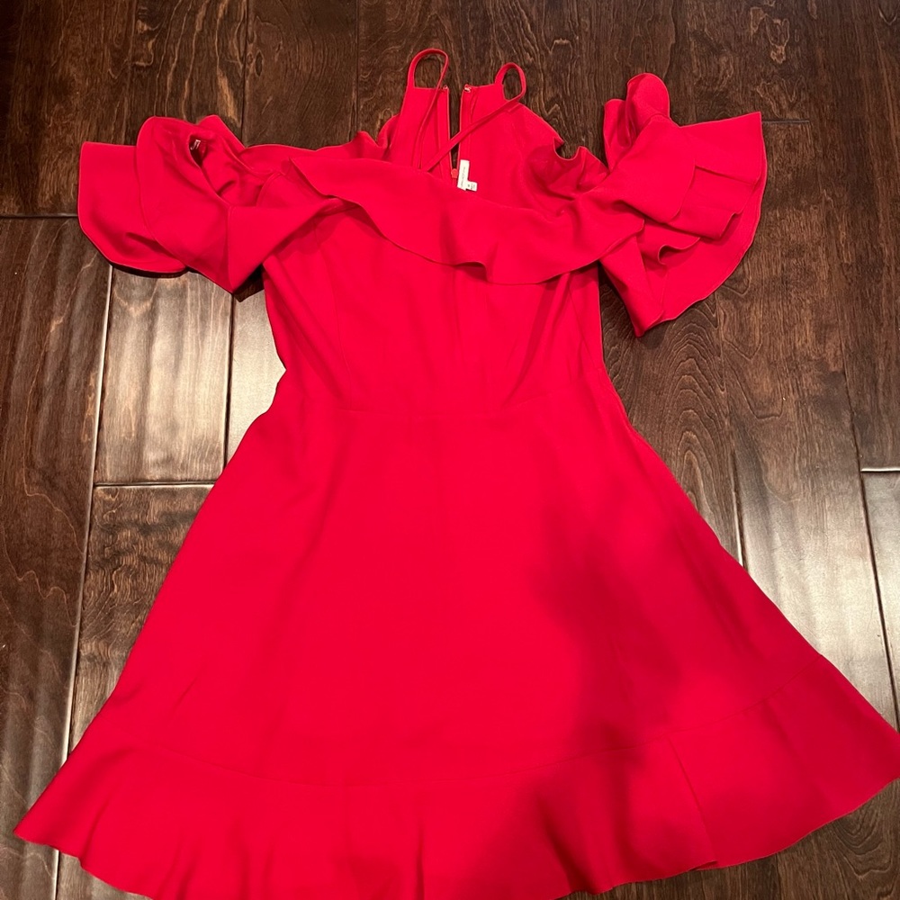 Brand new flirty red dress! Could should detail with straps by the neck!